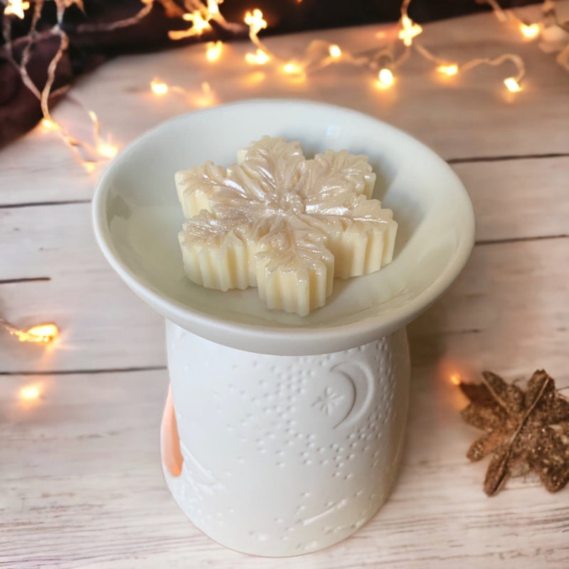 brûle parfum de noêl avec constellations et étoiles et un fondant parfumé au gui