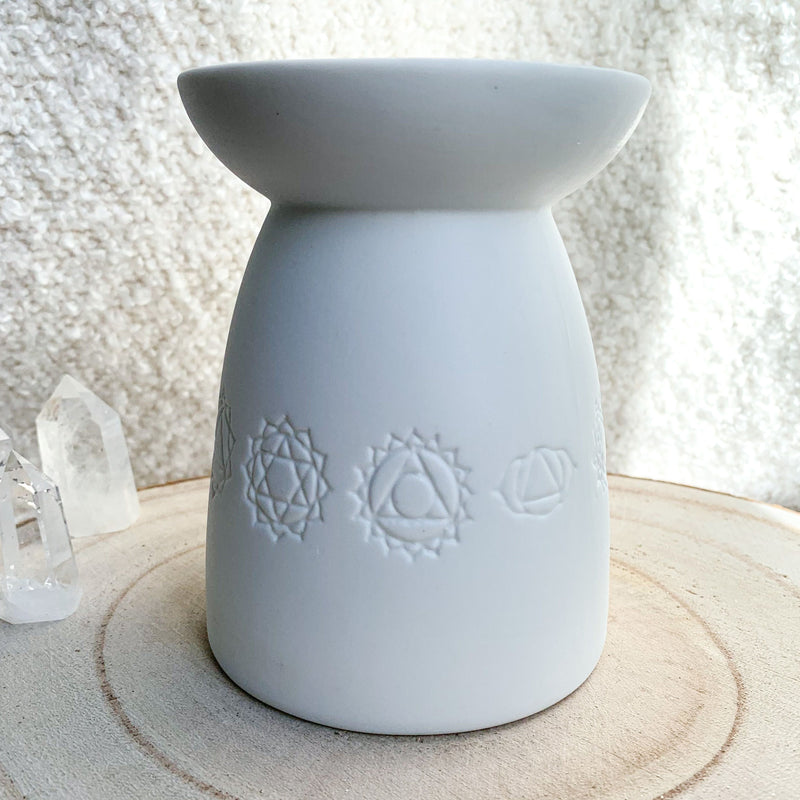 brûle parfum aux gravures spirituelles des 7 chakras pour faire fondre ces fondants ou bougies parfumées dans cet accessoire en céramique porcelaine naturelle blanche